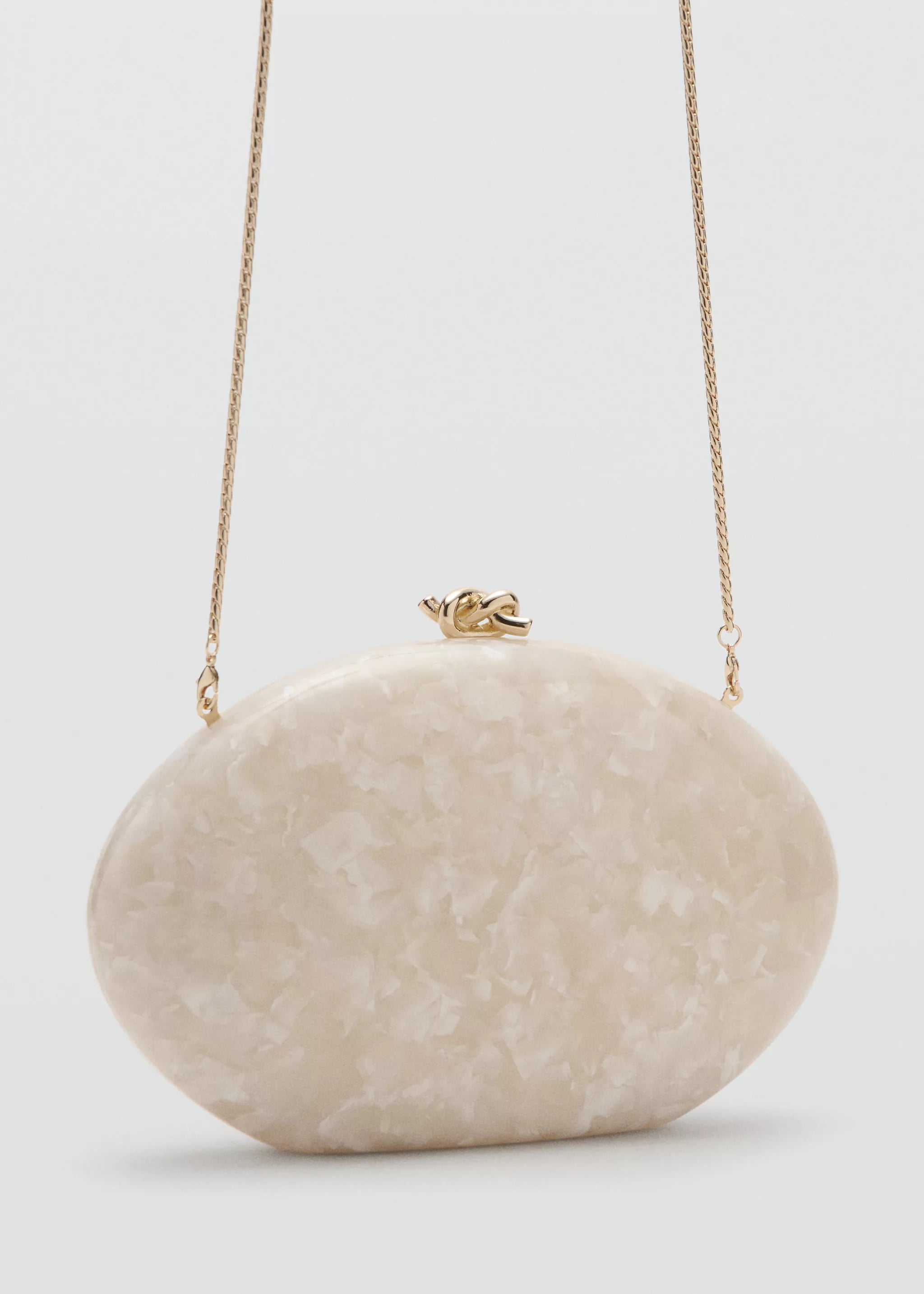 PEARL-EFFECT CLUTCH BAG