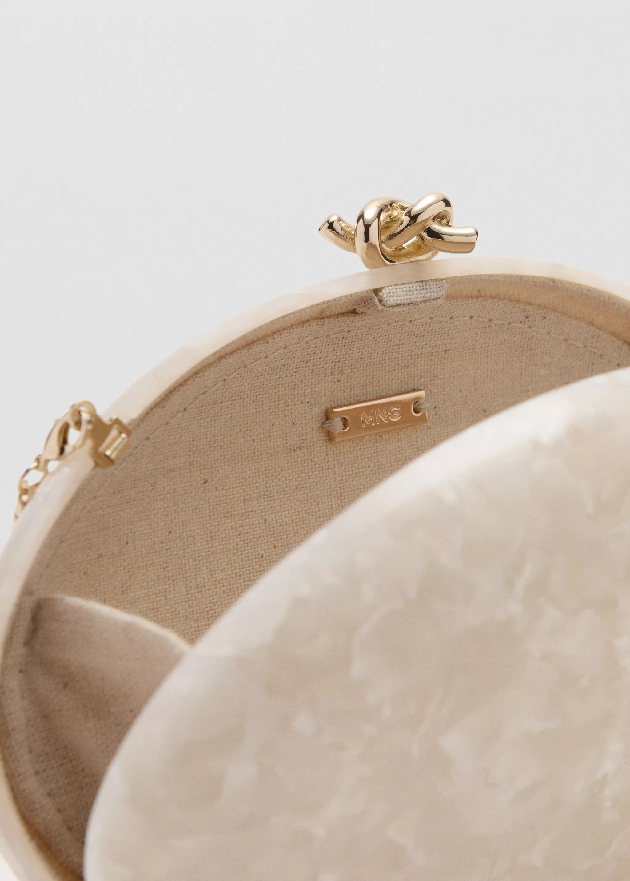 PEARL-EFFECT CLUTCH BAG