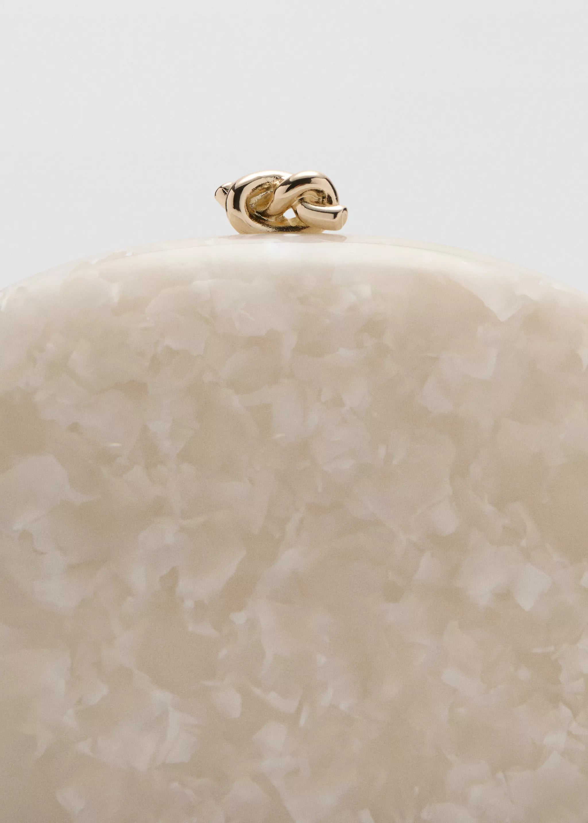 PEARL-EFFECT CLUTCH BAG